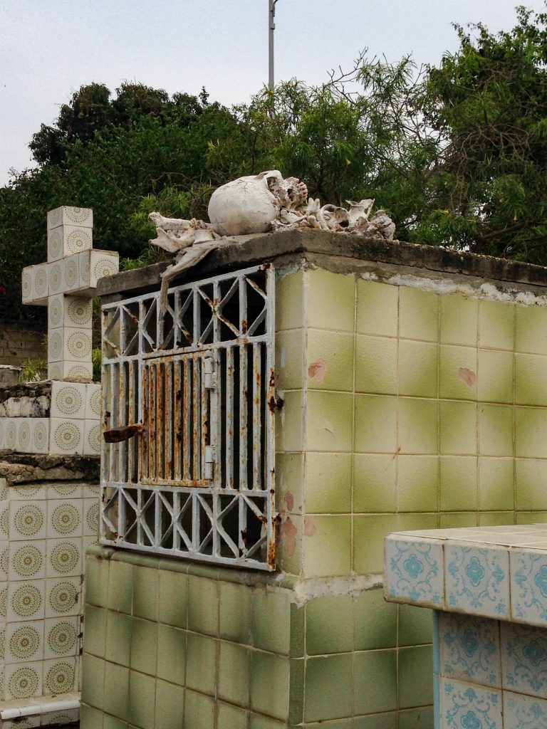 Tomb with skeleton on top