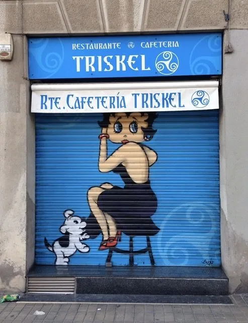 Betty Boop and her dog Bimbo on a storefront shutter