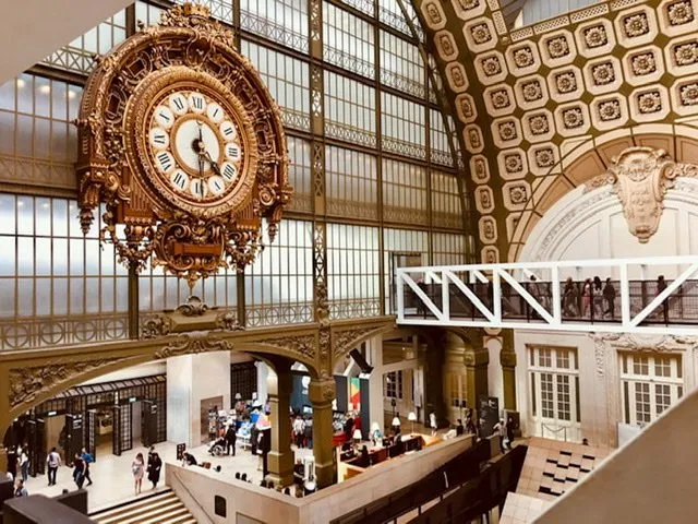 Interior of the Musée d’Orsay with a large gold clock