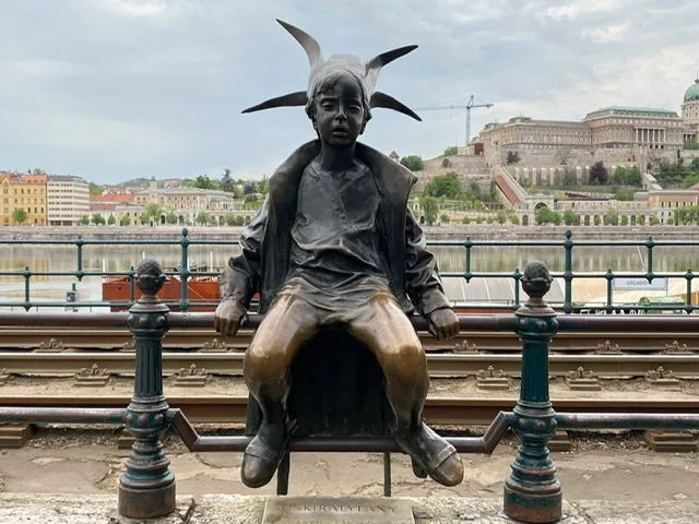 Statue of a child in a princess outfit