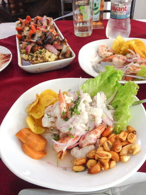 Three plates of Peruvian food