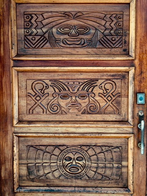 Wooden door with Inca style carvings