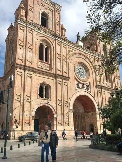 Man and woman standing in front of the New Cathedral
