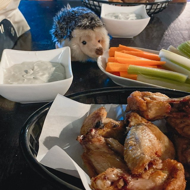 Toy hedgehog with chicken wings