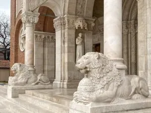 Lions at the entrance to the Votive Church in Szeged, Hungary