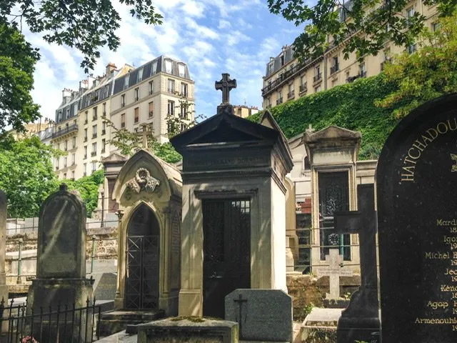 Mausoleums with buildings in the background