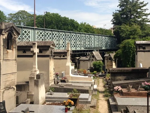 A bridge overlooking mausoleums and tombs