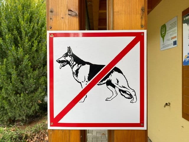 No dogs sign with a German Shepard