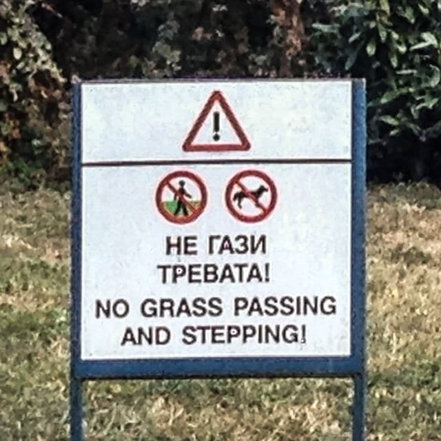 Sign saying “no grass passing”