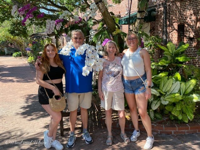 Four people in a garden