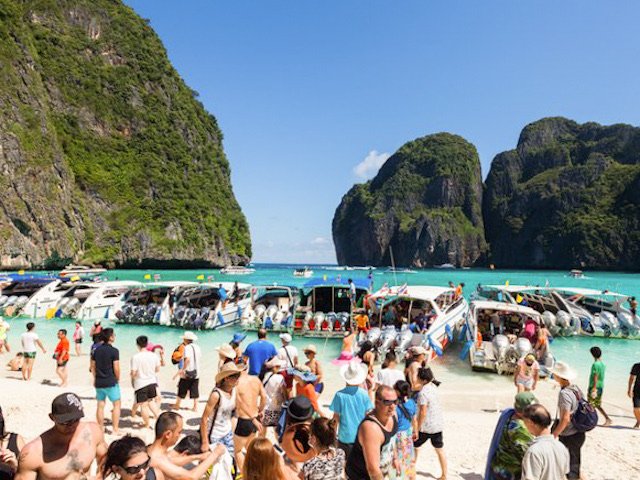 People and boats at Maya Bay