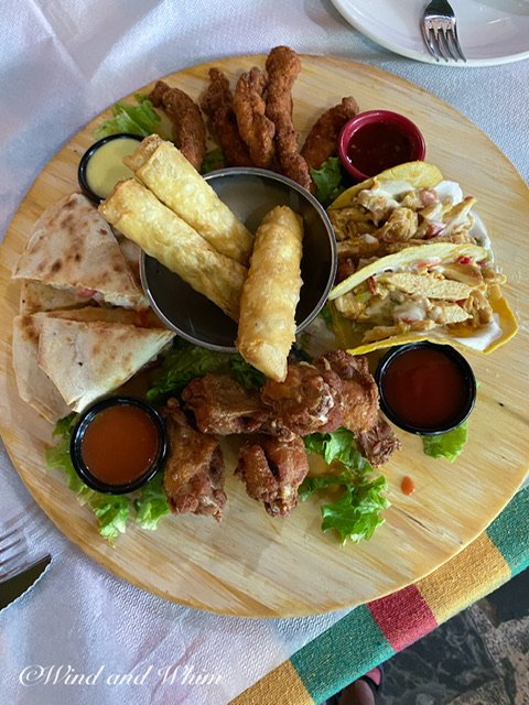 A platter of Mexican food