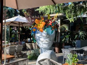 A large planter of a woman’s head