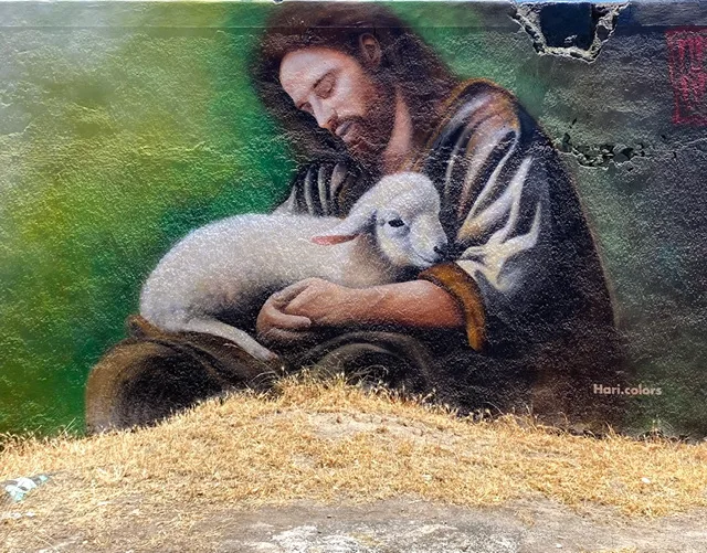 Jesus holding a lamb