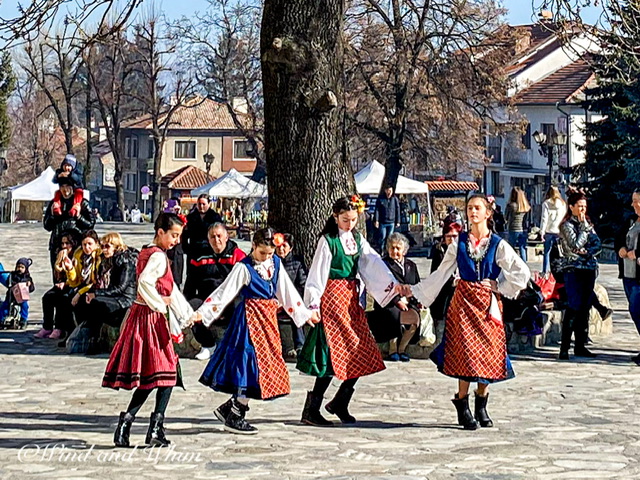 Girls dancing in Bulgarian costumes