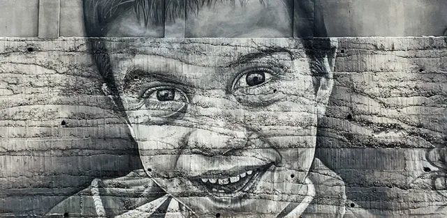 A mural of a boy