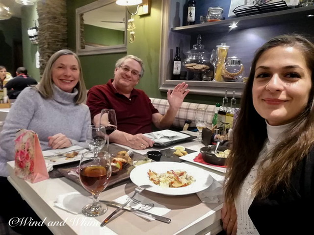 Three people eating in a restaurant