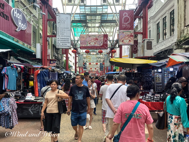 People shopping in a covered market