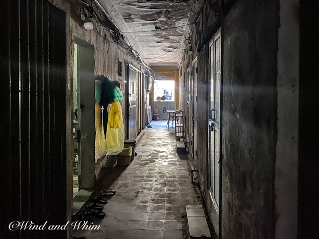 A dark and run-down hallway