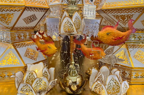 White and gold decorations with orange fish