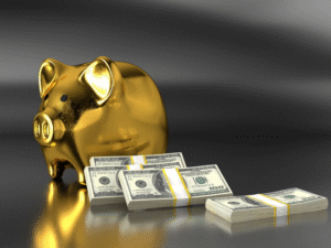 Gold piggy bank with bundles of $100 bills