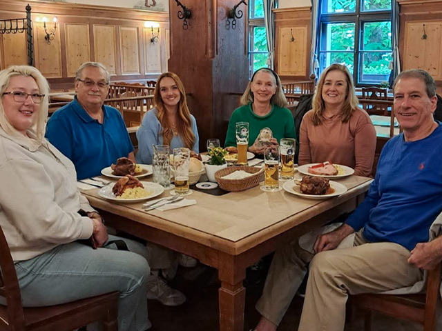 Six people at a dinner table