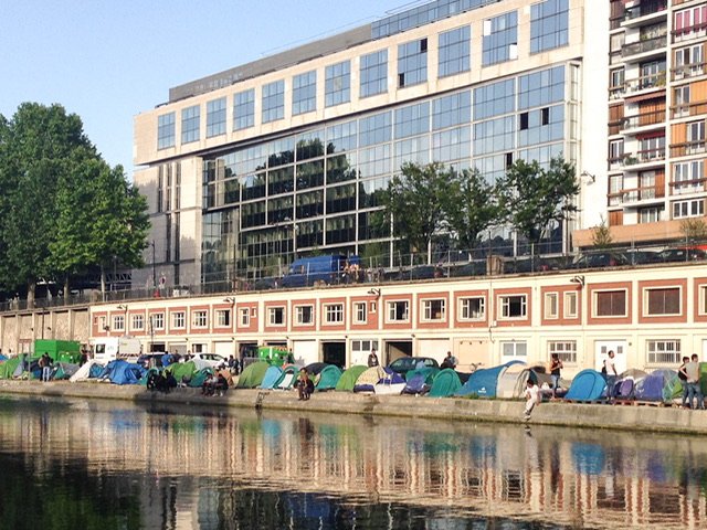Tents along a canal