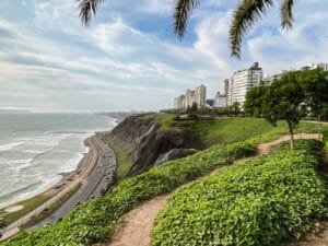 The ocean, cliffs, and high rises of Lima’s shore