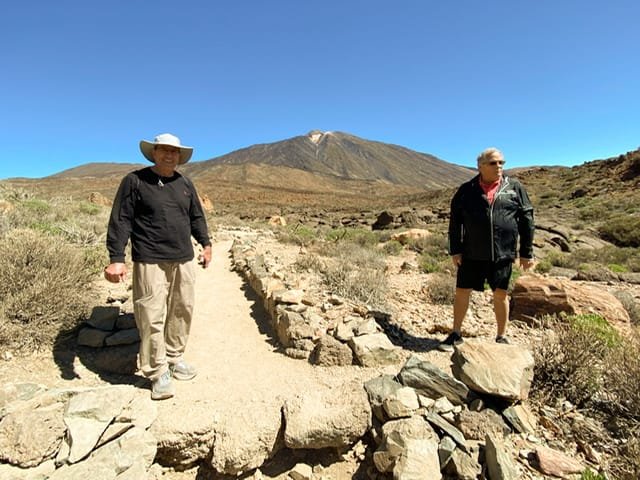 Two men on a mountain trail