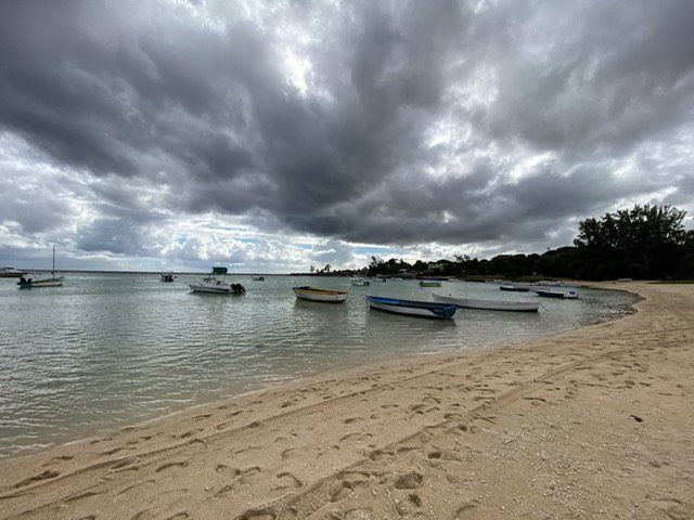 Boats under a cloudy sky