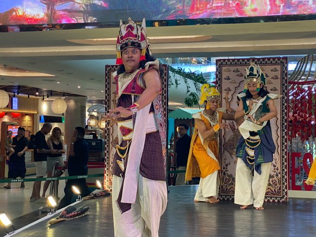 A man in costume with wild eyes