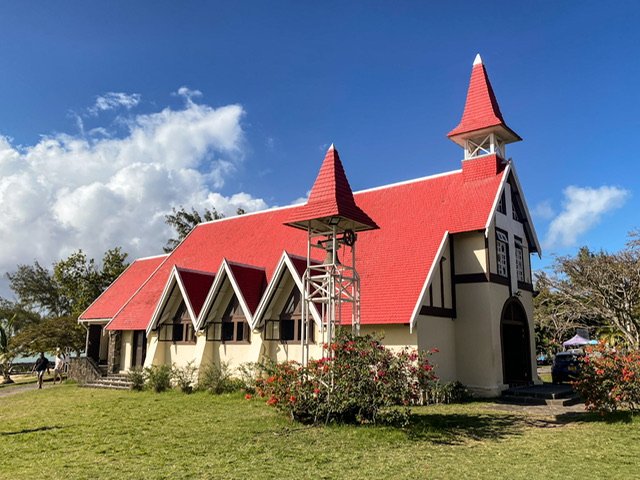 A red-roofed church
